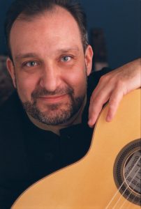 stephen marchionda with guitar