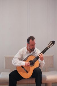 stephen marchionda with guitar